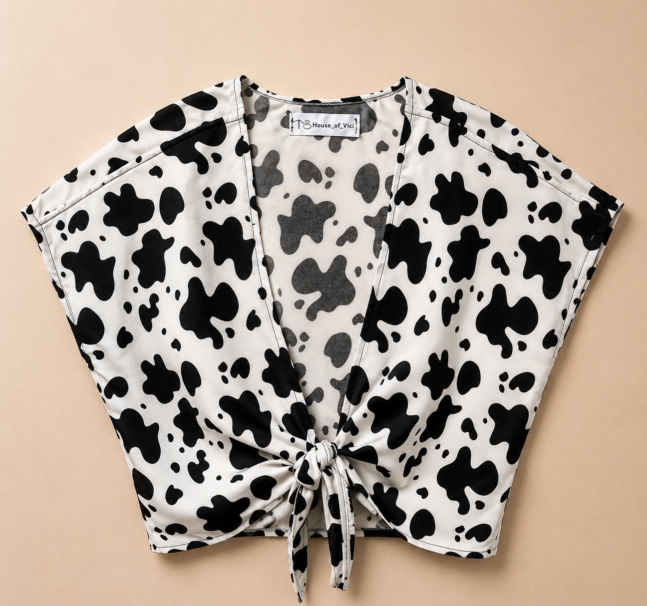 The wild daisy front tie top